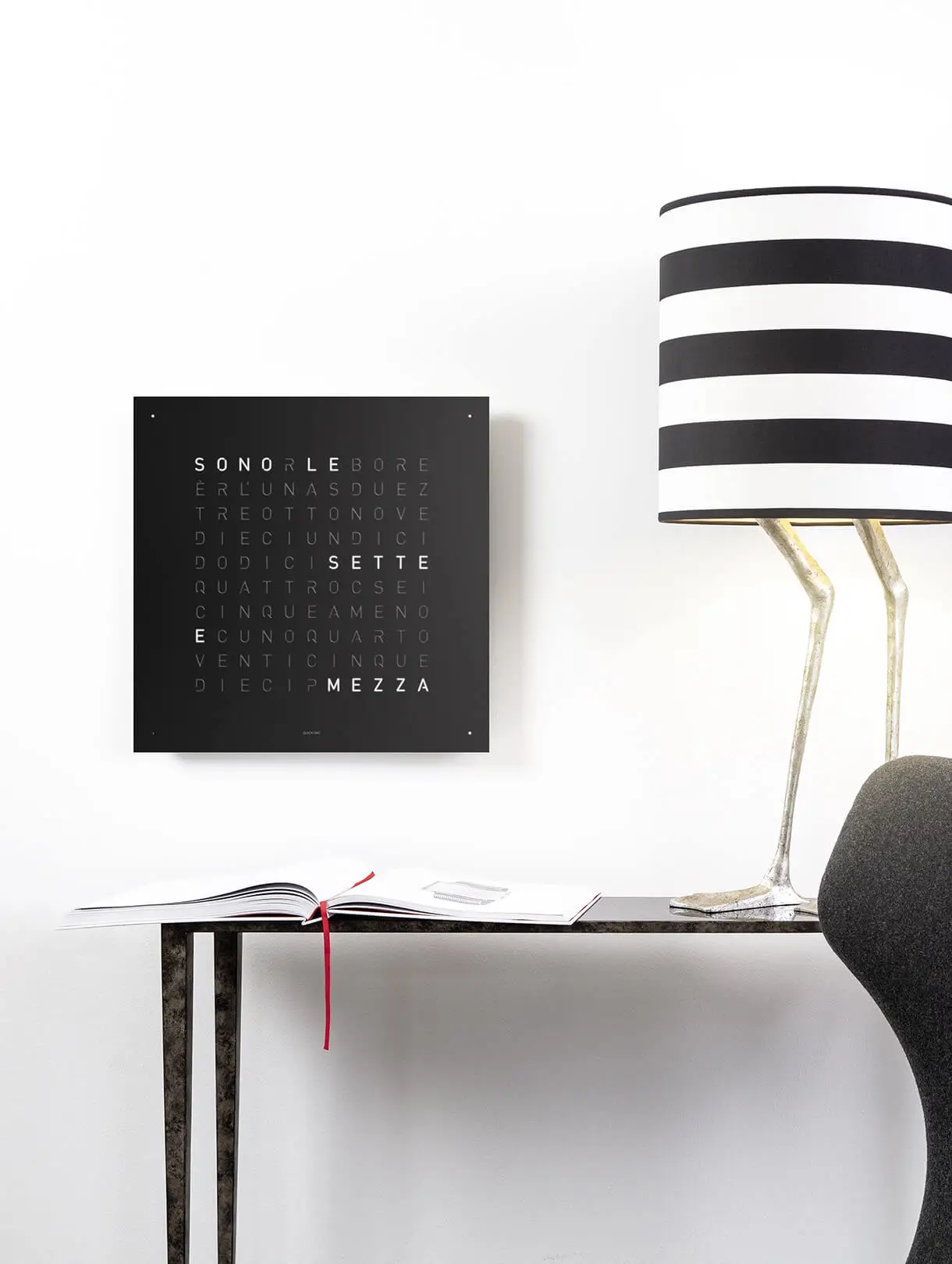 QLOCKTWO EARTH 45 Black Pepper word clock with black finish displayed in a modern living room