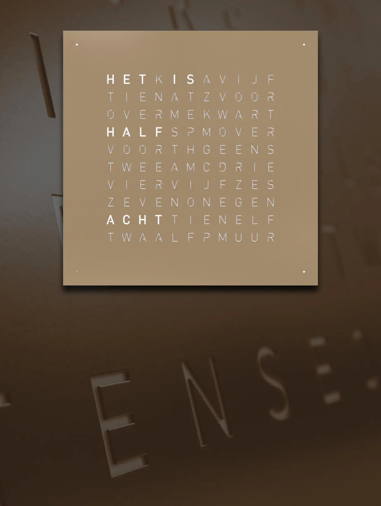 Front view of QLOCKTWO EARTH 45 Hazelnut word clock with typographic time display