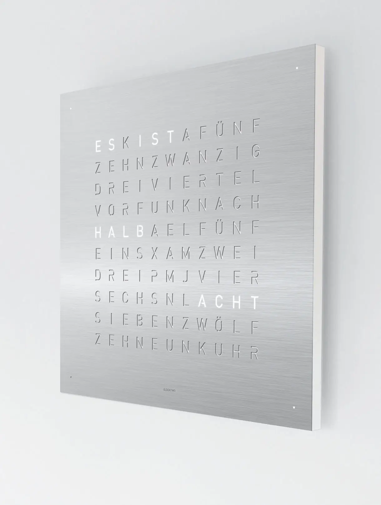 QLOCKTWO EARTH 45 Stainless Steel word clock with brushed metal surface in a modern interior