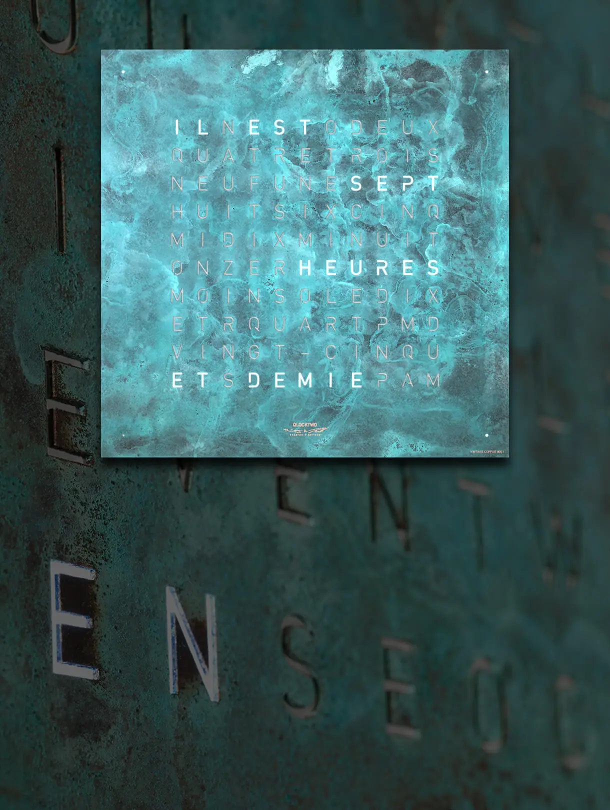 Front view of the QLOCKTWO EARTH 45 CREATOR'S EDITION VINTAGE COPPER word clocks for the wall with patinated steel front cover