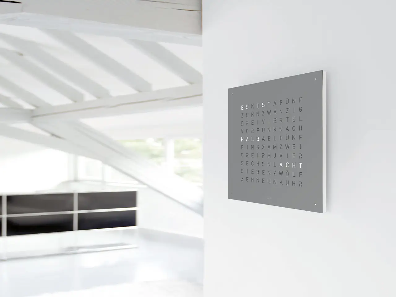 QLOCKTWO EARTH 45 Grey Pepper word clock with grey textured surface in a contemporary interior