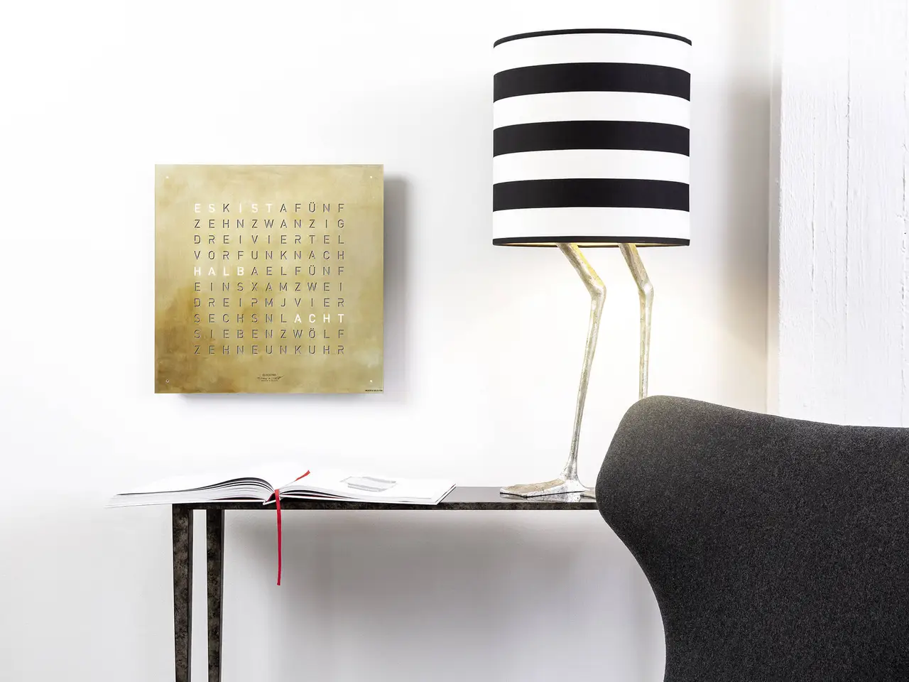 QLOCKTWO EARTH 45 Creator's Edition Silver & Gold word clock with precious metal surface in a luxury interior handcrafted with silver and gold leaf