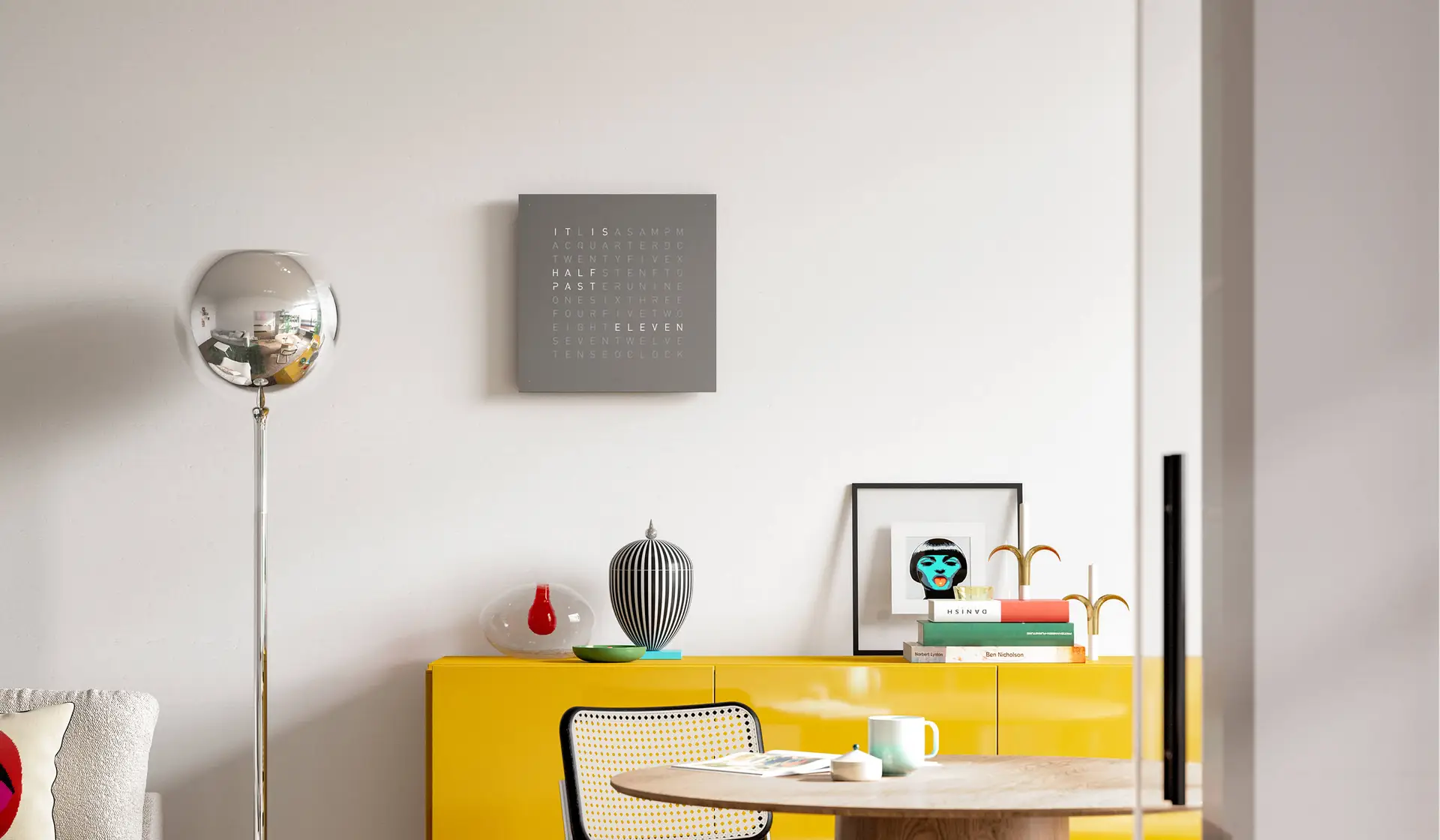QLOCKTWO EARTH 45 Grey Pepper word clock with grey textured surface in a contemporary interior