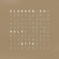 Front view of QLOCKTWO EARTH 45 Hazelnut word clock with typographic time display