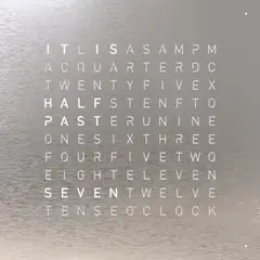 Front view of QLOCKTWO EARTH 45 Stainless Steel wall clock with typographic time display