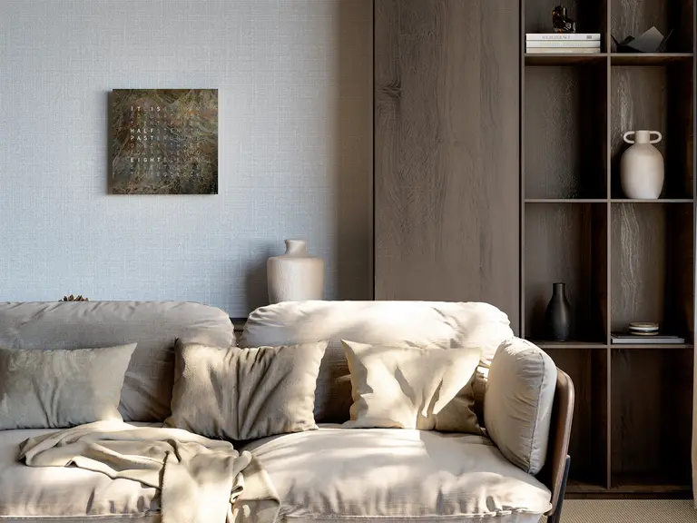 QLOCKTWO EARTH 45 Creator's Edition Glintscape word clock with shimmering sedimentary rock surface in a modern interior