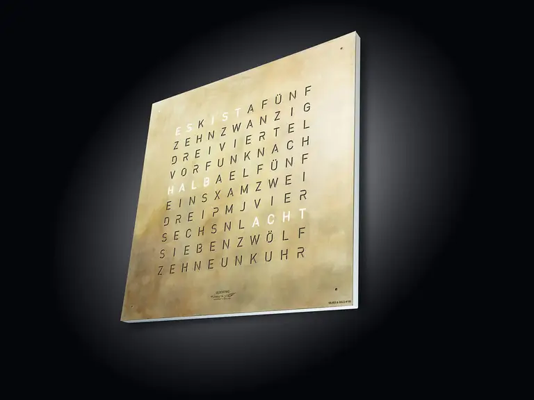 QLOCKTWO EARTH 45 Creator's Edition Silver & Gold word clock with precious metal surface in a luxury interior handcrafted with silver and gold leaf
