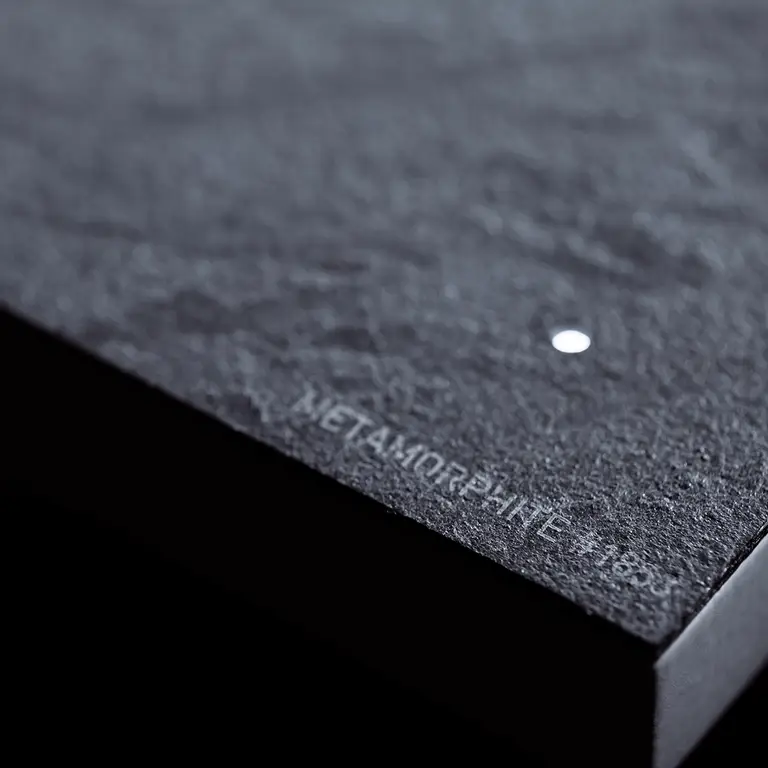 Close-up of QLOCKTWO EARTH 45 Creator's Edition Metamorphite natural slate stone texture