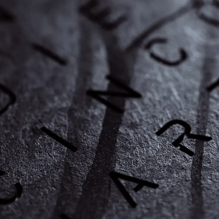 Close-up of QLOCKTWO EARTH 45 Creator's Edition Metamorphite natural slate stone texture