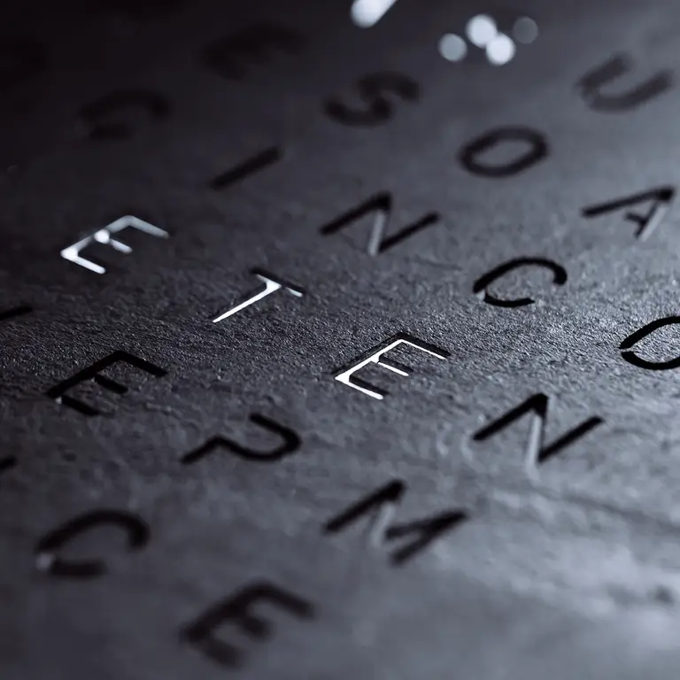 Close-up of QLOCKTWO EARTH 45 Creator's Edition Metamorphite natural slate stone texture