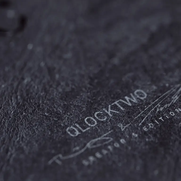 Close-up of QLOCKTWO EARTH 45 Creator's Edition Metamorphite natural slate stone texture