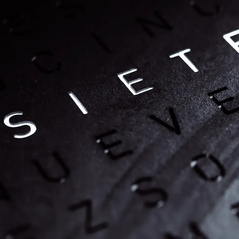 Close-up of QLOCKTWO EARTH 45 Creator's Edition Metamorphite natural slate stone texture